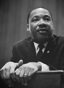225px-Martin-Luther-King-1964-leaning-on-a-lectern.jpg