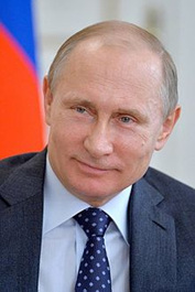 220px-Putin_with_flag_of_Russia.jpg